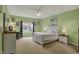 Bright bedroom with white furniture and a large window, providing ample natural light at 14242 Brandt Ln, Carmel, IN 46074