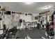Functional home gym featuring a variety of exercise machines, ideal for maintaining a healthy lifestyle at 14242 Brandt Ln, Carmel, IN 46074