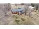 Aerial view showcasing the home with a sunroom, a large backyard, and outbuilding at 15247 E 191St St, Noblesville, IN 46060