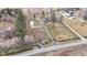 Expansive aerial view of the property, showcasing the house, detached garage, and land at 15247 E 191St St, Noblesville, IN 46060