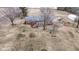 Aerial view of the home with a sunroom, large backyard, and mature trees on the property at 15247 E 191St St, Noblesville, IN 46060