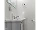 Bathroom featuring a pedestal sink, beadboard walls, and chrome fixtures at 15247 E 191St St, Noblesville, IN 46060
