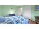 Calming bedroom with light green walls, hardwood floors, double closets, and white trim at 15247 E 191St St, Noblesville, IN 46060