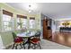 Cozy breakfast nook with a decorative table, comfortable seating, and natural light from surrounding windows at 15247 E 191St St, Noblesville, IN 46060