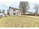 Wide shot of the backyard featuring a fenced-in yard and mature trees at 15281 Proud Truth Dr, Noblesville, IN 46060