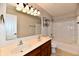 Bathroom features a dual sink vanity, an oversized mirror, and a shower-tub combo at 15281 Proud Truth Dr, Noblesville, IN 46060
