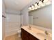 Well-lit bathroom includes a double sink vanity, a mirror, and a shower/tub combination at 15281 Proud Truth Dr, Noblesville, IN 46060