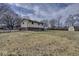 Large backyard with the home to the left and a shed to the right of the image at 1612 Westbay Ct, Indianapolis, IN 46260