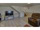 Finished basement features a large sectional sofa and entertainment center at 1612 Westbay Ct, Indianapolis, IN 46260