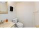 Compact half-bathroom with updated fixtures and neutral color scheme at 1612 Westbay Ct, Indianapolis, IN 46260