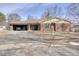 Charming brick home featuring an attached garage and a well-maintained front yard, perfect for suburban living at 1612 Westbay Ct, Indianapolis, IN 46260