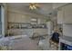 Bright eat-in kitchen with white cabinetry at 1612 Westbay Ct, Indianapolis, IN 46260