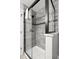Modern tiled shower with glass doors, a shower head and neutral tile at 1621 Nottingham Dr, Indianapolis, IN 46240