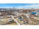 Aerial view of home in neighborhood with downtown skyline in background at 1842 Tallman Ave, Indianapolis, IN 46218
