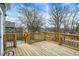 Backyard features a wooden deck that is ready for entertaining and relaxing at 1842 Tallman Ave, Indianapolis, IN 46218
