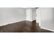 Large bedroom with sliding closet doors and dark wood flooring at 1842 Tallman Ave, Indianapolis, IN 46218