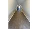 View of a long attic space with neutral walls and carpet with windows at the end at 2133 Webb St, Indianapolis, IN 46225