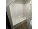 Bright bathroom featuring a tub/shower with white subway tile and vinyl floors at 2133 Webb St, Indianapolis, IN 46225