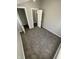 Bright bedroom with plush neutral carpet and neutral colored walls at 2133 Webb St, Indianapolis, IN 46225