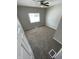 Cozy bedroom with neutral walls, plush carpeting, and a ceiling fan at 2133 Webb St, Indianapolis, IN 46225