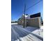 Exterior view of home showing snowy yard and side of house at 2133 Webb St, Indianapolis, IN 46225