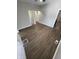 Neutral living room with wood-look floors and multiple entryways at 2133 Webb St, Indianapolis, IN 46225