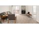 Comfortable living room featuring a fireplace and access to a balcony at 3038 Wildcat Ln, Indianapolis, IN 46203