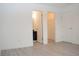 Neutral bedroom showcases wood floors, neutral walls and provides access to the bathroom and closet at 400 Lockerbie Ln, Pittsboro, IN 46167