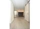 Open living room with a striking black brick fireplace at 400 Lockerbie Ln, Pittsboro, IN 46167