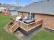 A spacious wooden deck with outdoor furniture, perfect for entertaining, in a well-maintained backyard at 4019 Santa Clara Dr, Greenwood, IN 46142