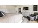 Comfortable bedroom with a queen bed, dresser, and chair at 4019 Santa Clara Dr, Greenwood, IN 46142