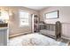 Charming Bedroom featuring a classic crib, soft rug, and decor, creating a cozy and inviting space at 4019 Santa Clara Dr, Greenwood, IN 46142