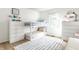 Bright bedroom featuring a bunk bed, dresser, and a soft rug, offering a cozy and functional space at 4019 Santa Clara Dr, Greenwood, IN 46142