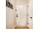 Bright entryway features hardwood floors, a decorative 'Home Sweet Home' sign, and a classic white door at 4019 Santa Clara Dr, Greenwood, IN 46142