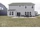 Outdoor patio area with seating set, ideal for outdoor entertaining in a spacious backyard at 4078 Omaha Dr, Bargersville, IN 46106