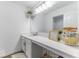 Well-lit bathroom with a spacious vanity, ample counter space, and modern fixtures at 4078 Omaha Dr, Bargersville, IN 46106
