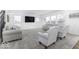Spacious living room with plush carpet, neutral tones, lots of natural light and comfortable seating at 4078 Omaha Dr, Bargersville, IN 46106