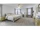 Spacious main bedroom with neutral tones, a ceiling fan, and lots of natural light at 4078 Omaha Dr, Bargersville, IN 46106
