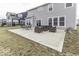 This home has a concrete patio perfect for entertaining with a dining table, fire pit, and furniture set at 4078 Omaha Dr, Bargersville, IN 46106
