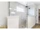 Walk-in shower with modern tile, glass panels, rainfall shower head, and natural light at 4078 Omaha Dr, Bargersville, IN 46106