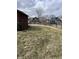 Large backyard with a grassy area and view of neighboring homes at 410 N Euclid Ave, Indianapolis, IN 46201