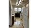 Functional kitchen features ample counter space, essential appliances, and abundant natural light at 410 N Euclid Ave, Indianapolis, IN 46201