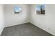 Cozy bedroom features neutral paint, plush carpet, and plenty of natural light at 415 W Gimber St, Indianapolis, IN 46225