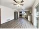 Modern kitchen with stainless steel appliances, and stylish wood grain flooring at 415 W Gimber St, Indianapolis, IN 46225