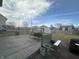 Spacious back deck with swing seating offering relaxing views and outdoor living space at 4418 Tarragon Dr, Indianapolis, IN 46237