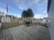 Enjoy outdoor relaxation on this spacious back deck with included swing, perfect for unwinding at 4418 Tarragon Dr, Indianapolis, IN 46237