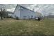Spacious backyard with a patio, providing a great area for relaxation and outdoor activities at 4418 Tarragon Dr, Indianapolis, IN 46237