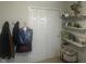 Bedroom closet featuring double doors and adjacent shelving at 4418 Tarragon Dr, Indianapolis, IN 46237