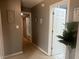Hallway with neutral paint color that features views to other rooms of the property at 4418 Tarragon Dr, Indianapolis, IN 46237