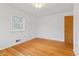 Bright bedroom features a closet and a window offering natural lighting at 488 N 24Th Ave, Beech Grove, IN 46107